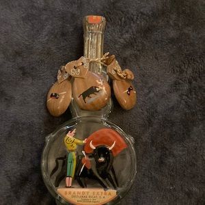Brandy Extra bottle from Spain with wooden spoons